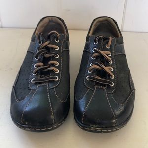 Born black leather sneaker. Size 7 1/2, 38.5